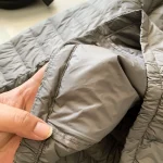 Patagonia navy blue stand-collar down jacket - Image 7